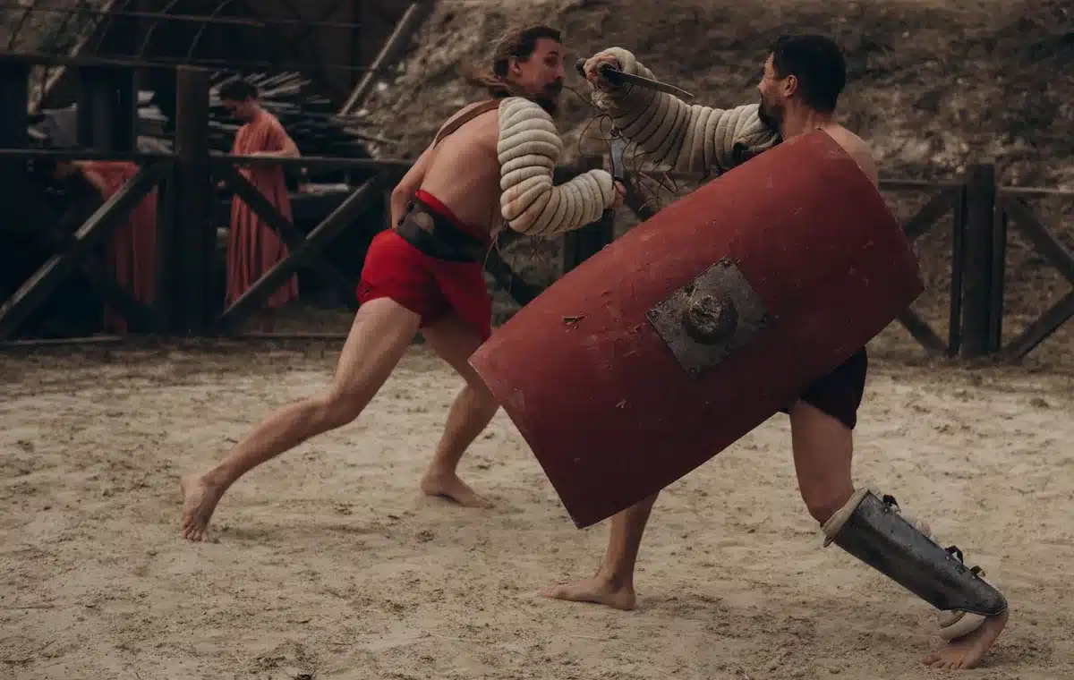 Guerreros en combate cuerpo a cuerpo durante una batalla épica antigua